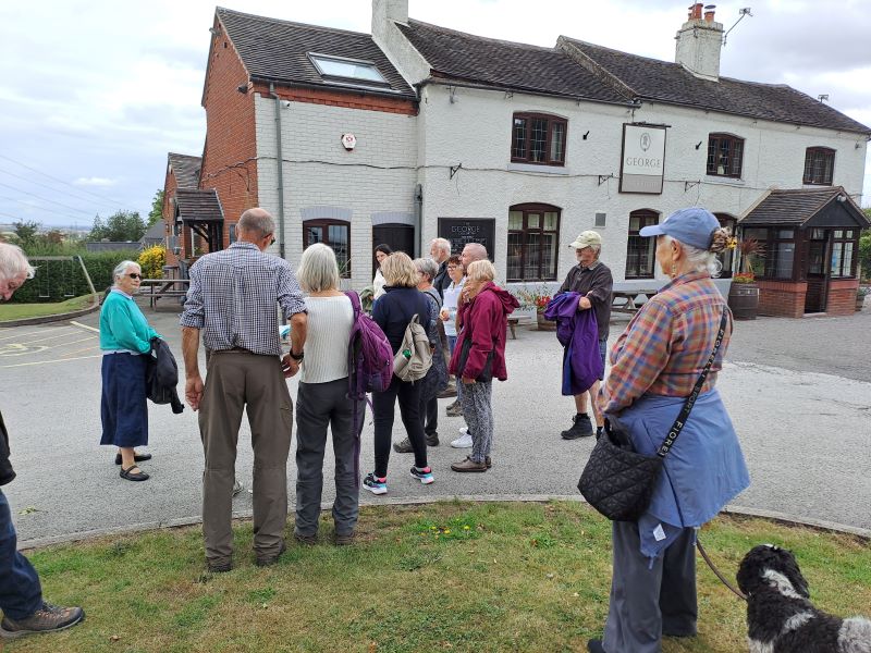 walkers outside The George Inn